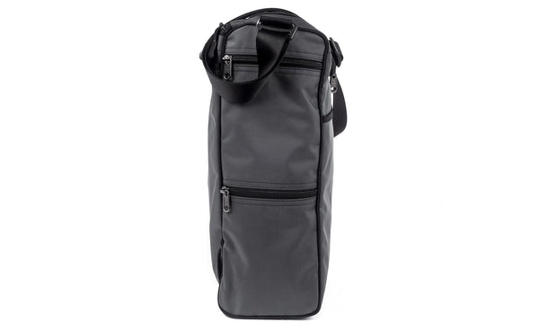 Left side of Cambiata with two small stacked zipper pockets.